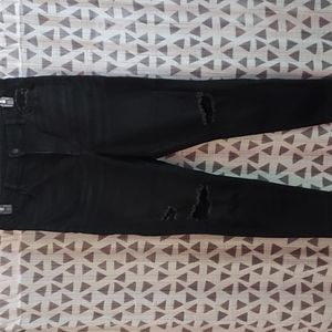 Ripped knee skinny jeans